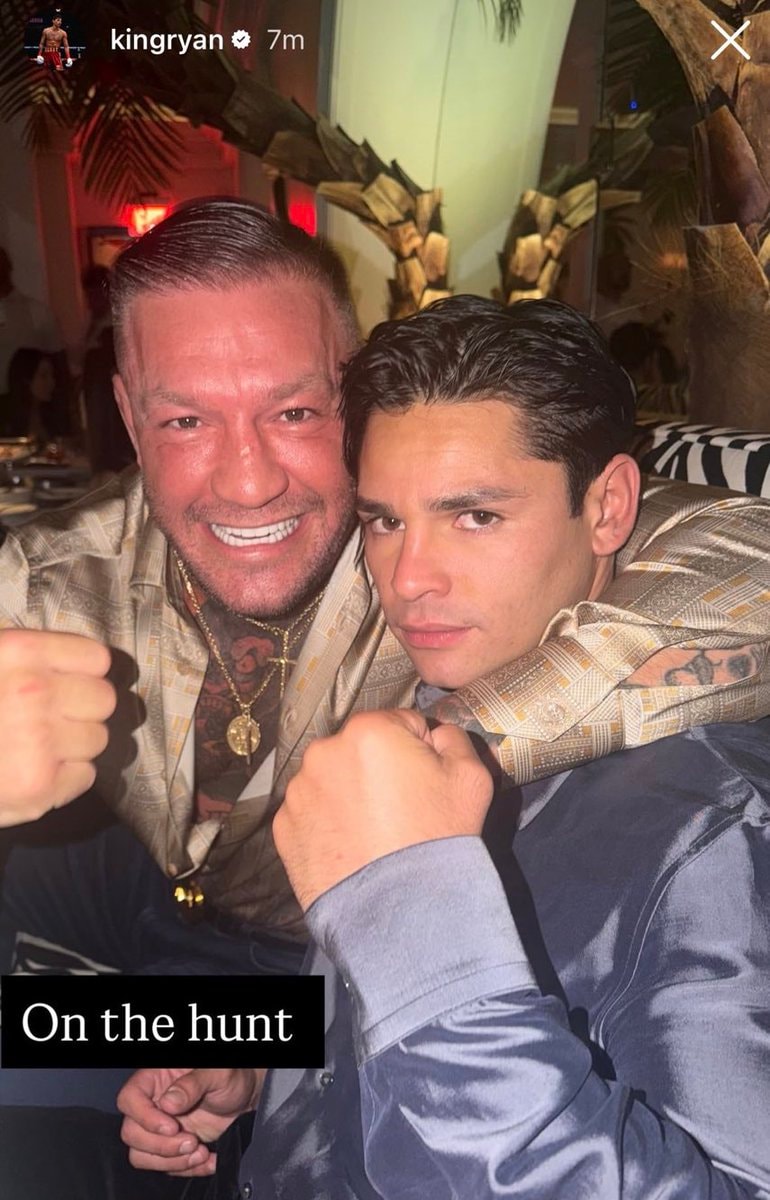 two boxers posing together