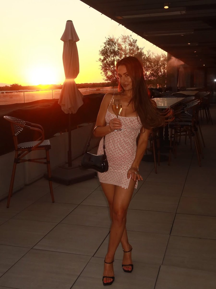 Nikki Bella sunset champagne