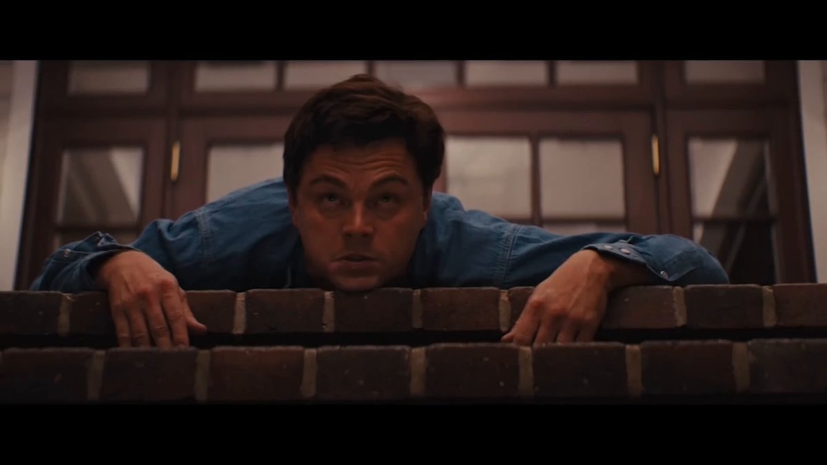 Leonardo DiCaprio Wolf of Wall Street crawl scene