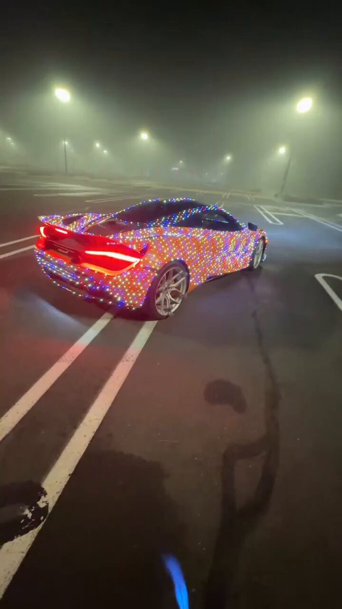 car covered in colorful lights