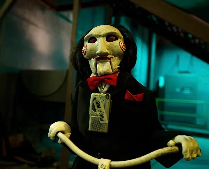 Billy the Puppet on tricycle