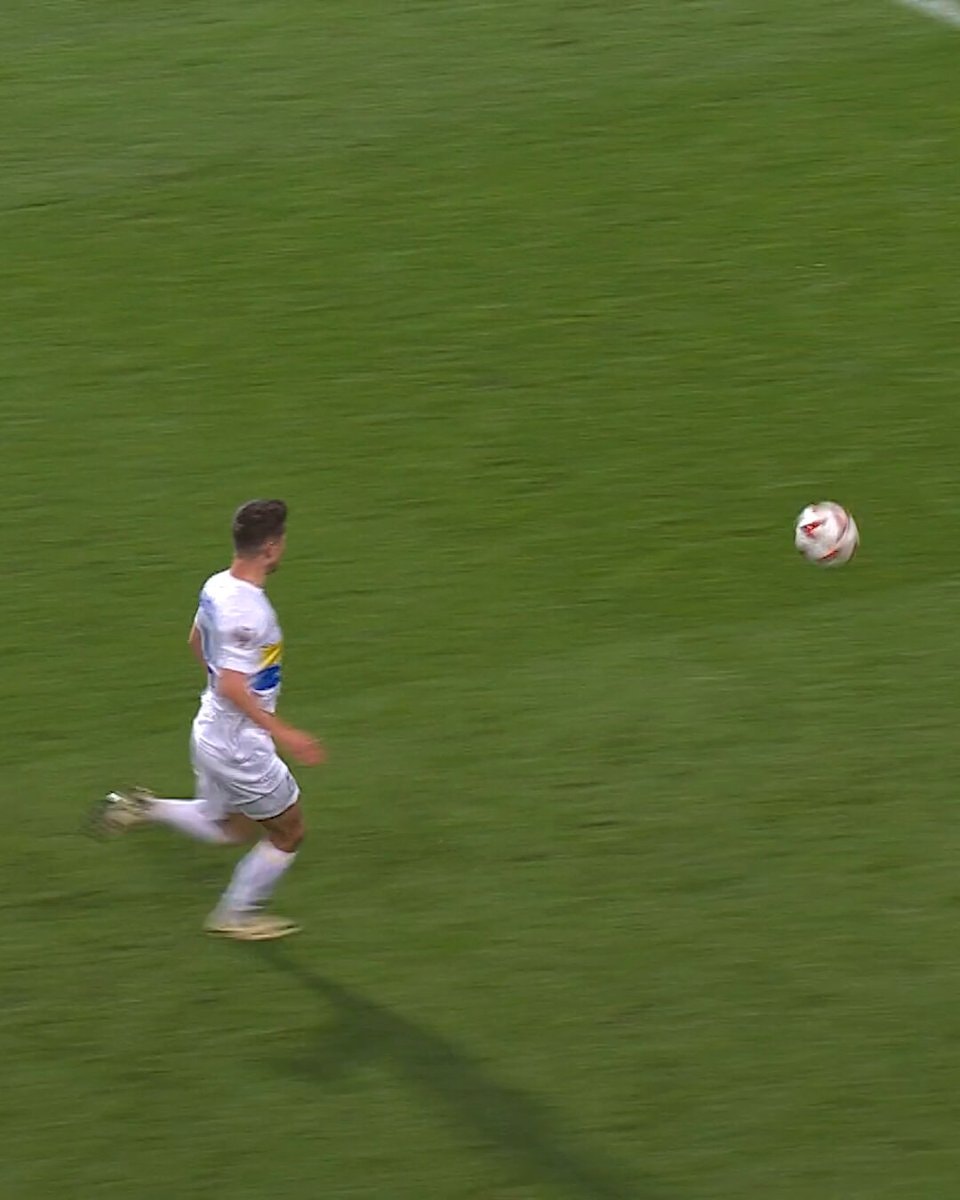 soccer player white kit on field