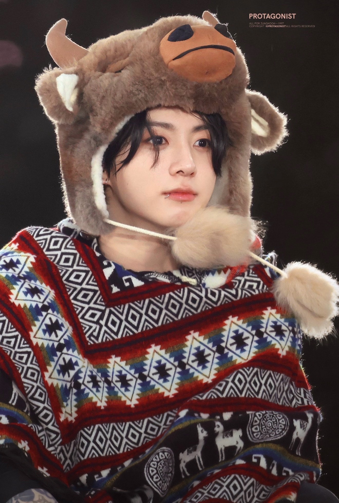 adorable fuzzy hat moment (photo 3 of 4)