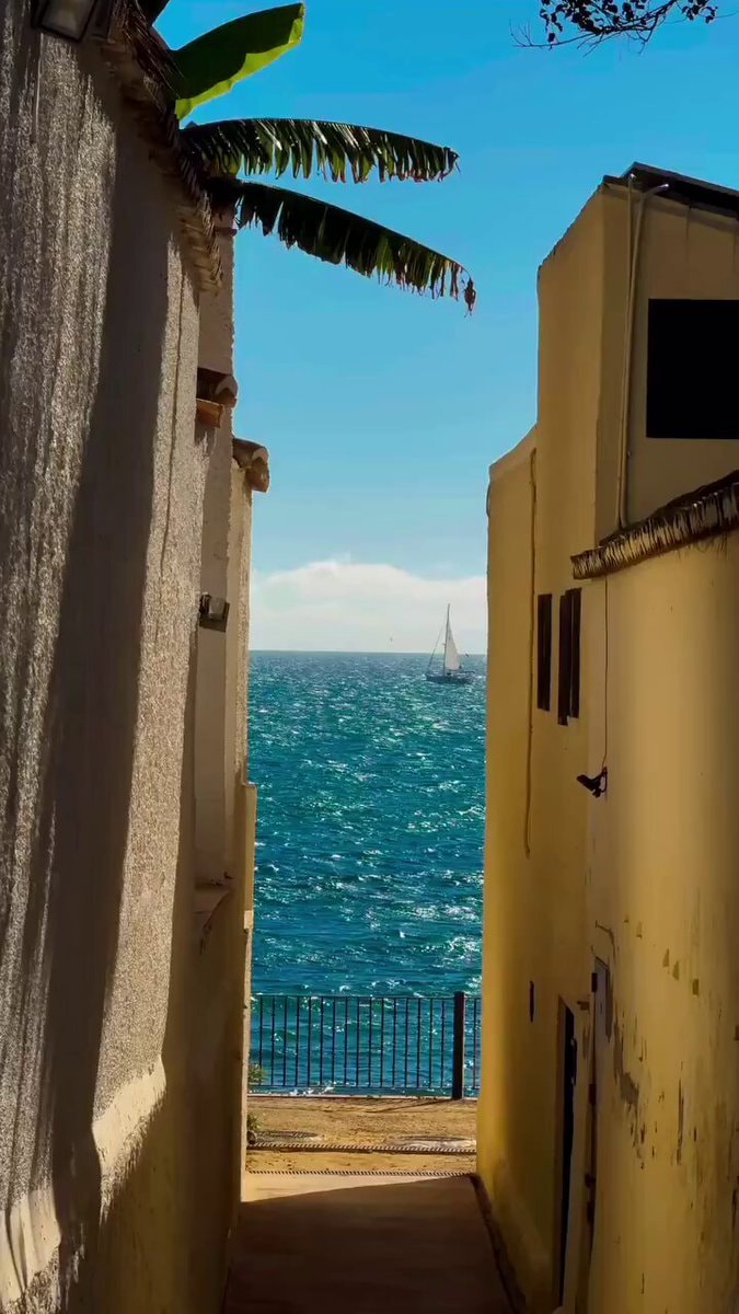 Malaga Spain alley sea view