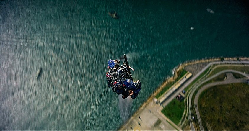 dark robot falling from sky