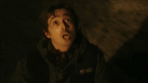 Shocked man in orange light reaction