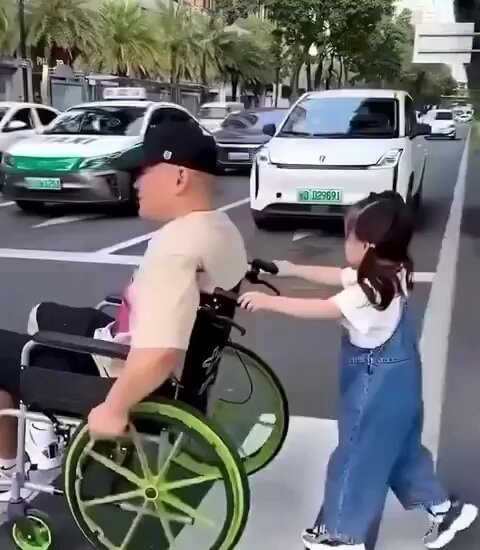 Girl bows to thank drivers