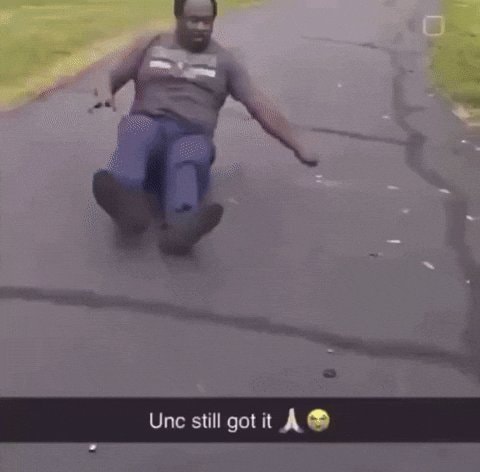 man sliding on butt