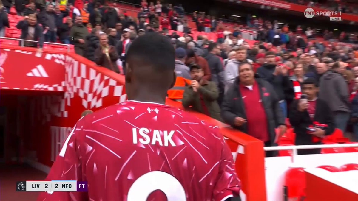 Liverpool fan takes Isak shirt
