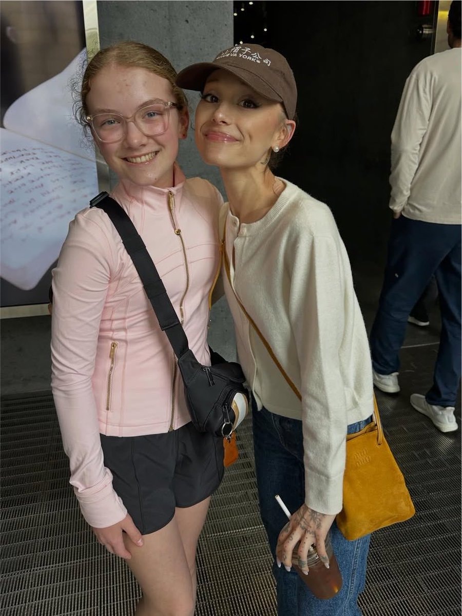 Ariana Grande with fan