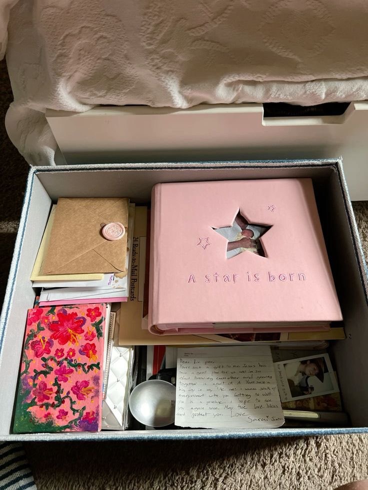 notebook stack on bed (photo 2 of 4)
