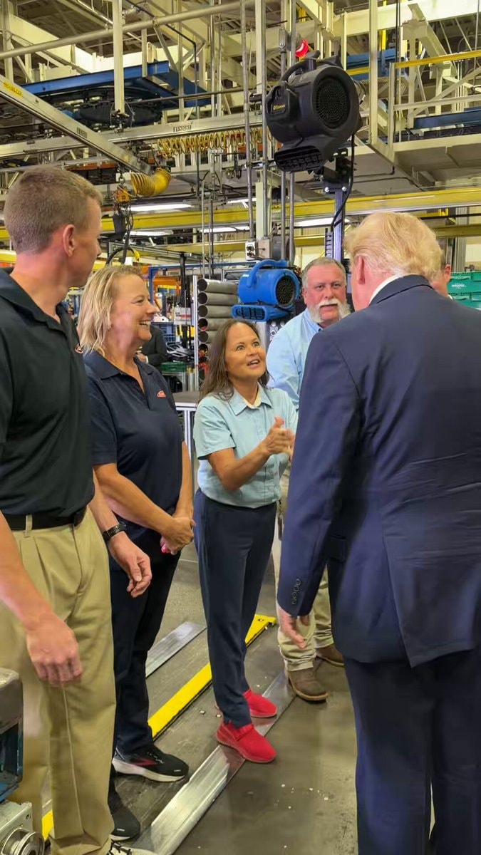 Trump hugs Peterbilt worker in Texas