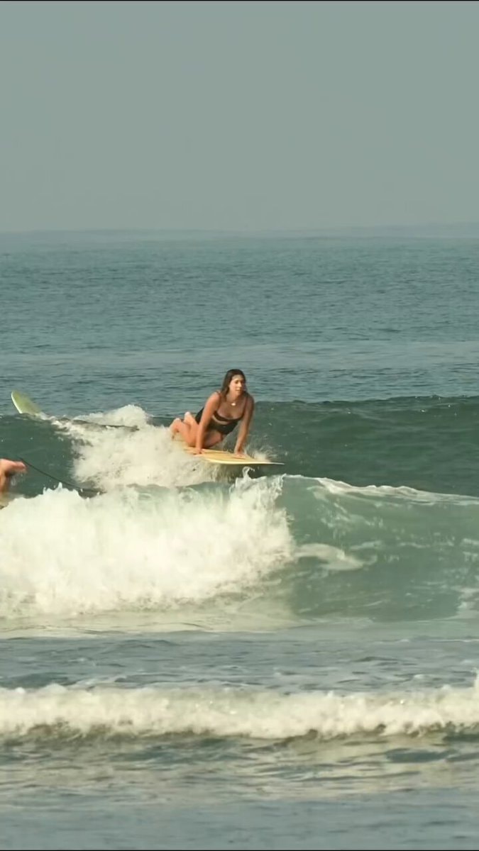 surfing yellow board surfing yellow board