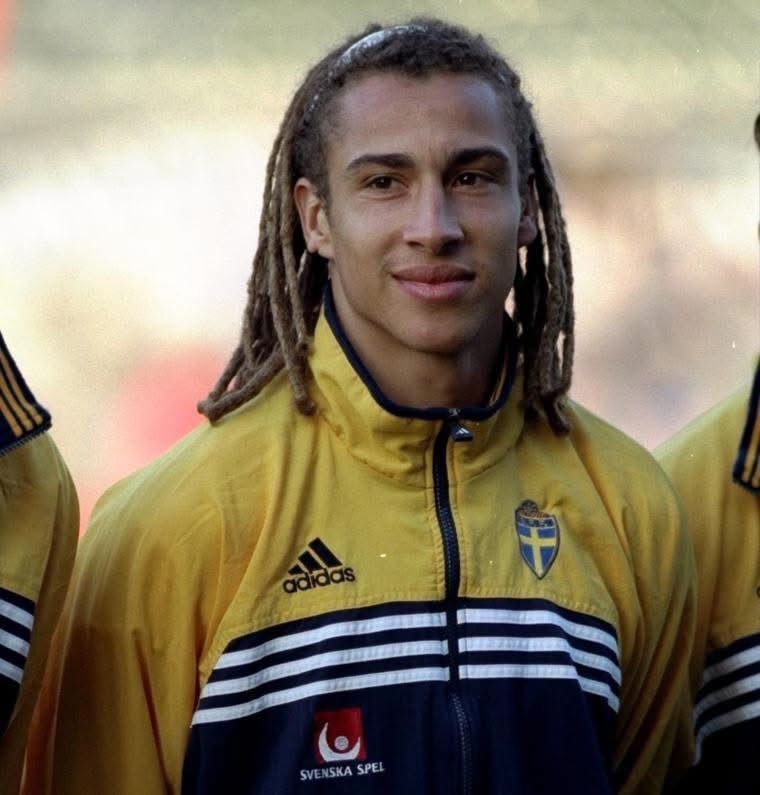 young athlete with dreadlocks