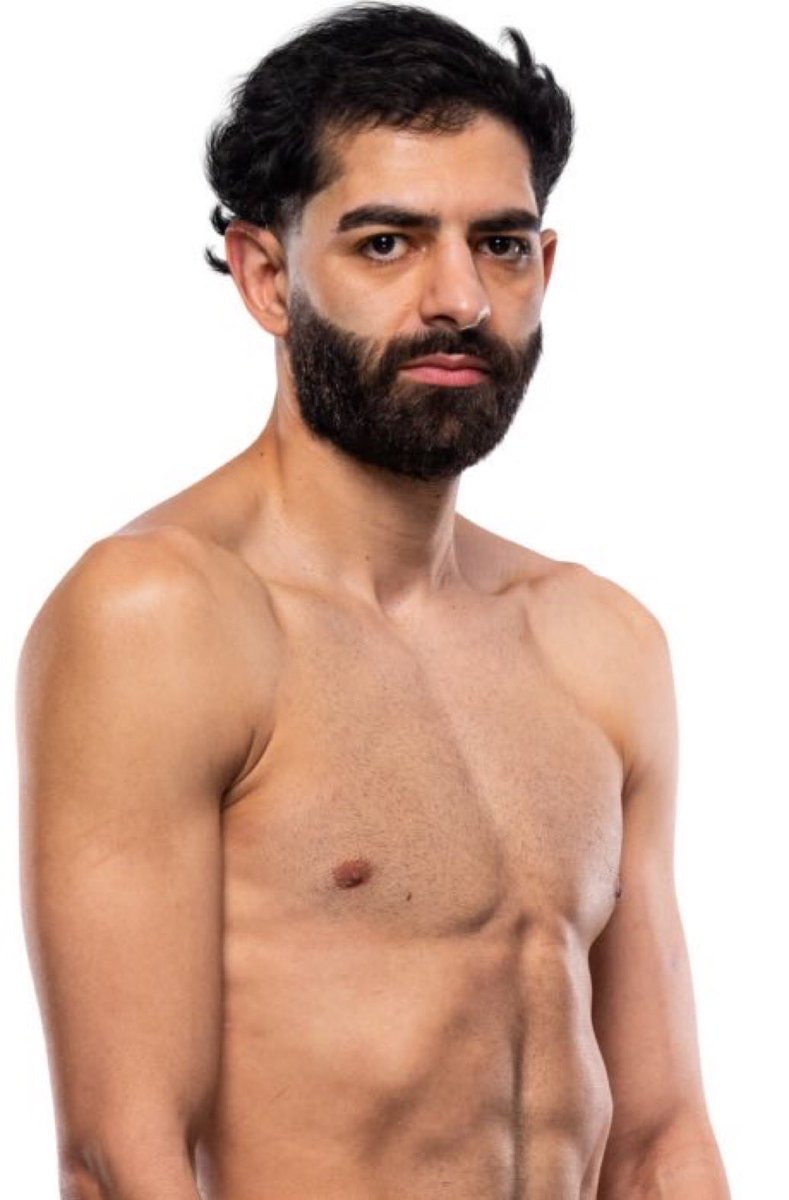 shirtless man with beard