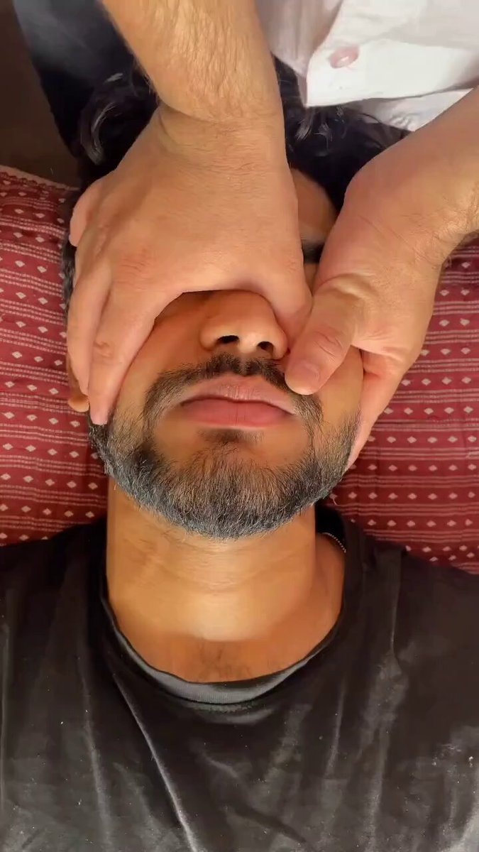 Man receives intense facial massage