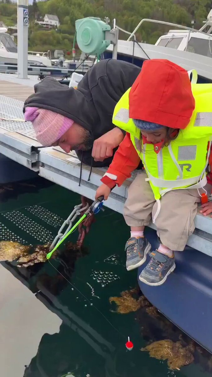 Dad and daughter fishing moment