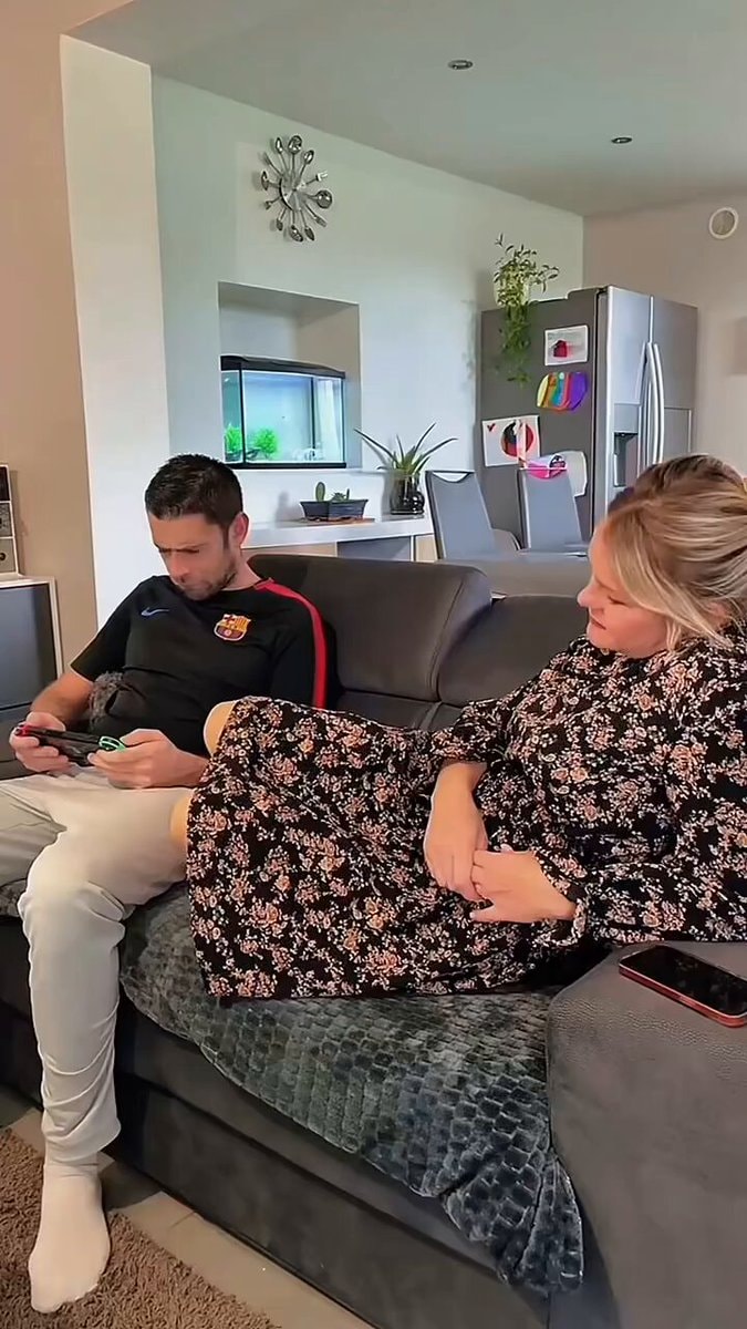 gaming couple on couch