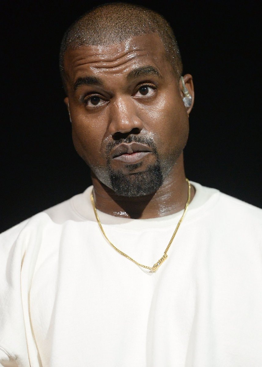 Ye serious portrait Saint chain