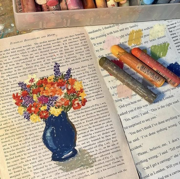 blue vase with colorful flowers