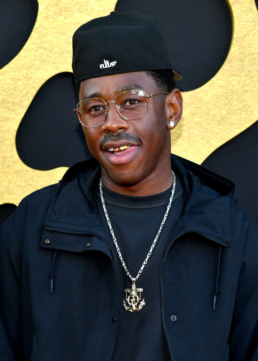 Tyler The Creator black cap gold anchor
