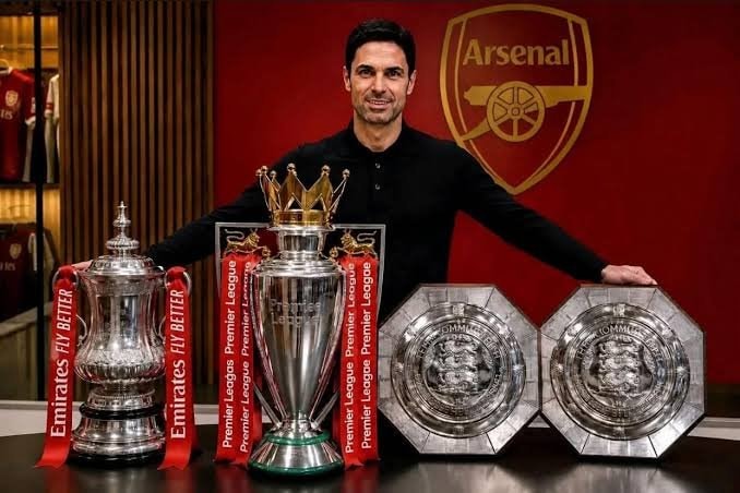 Mikel Arteta with trophies