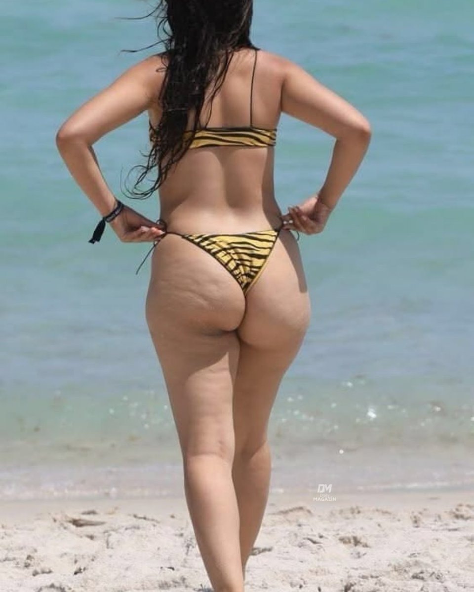 Camilla Cobello tiger-print bikini (photo 2 of 2) Camilla Cobello tiger-print bikini (photo 2 of 2)