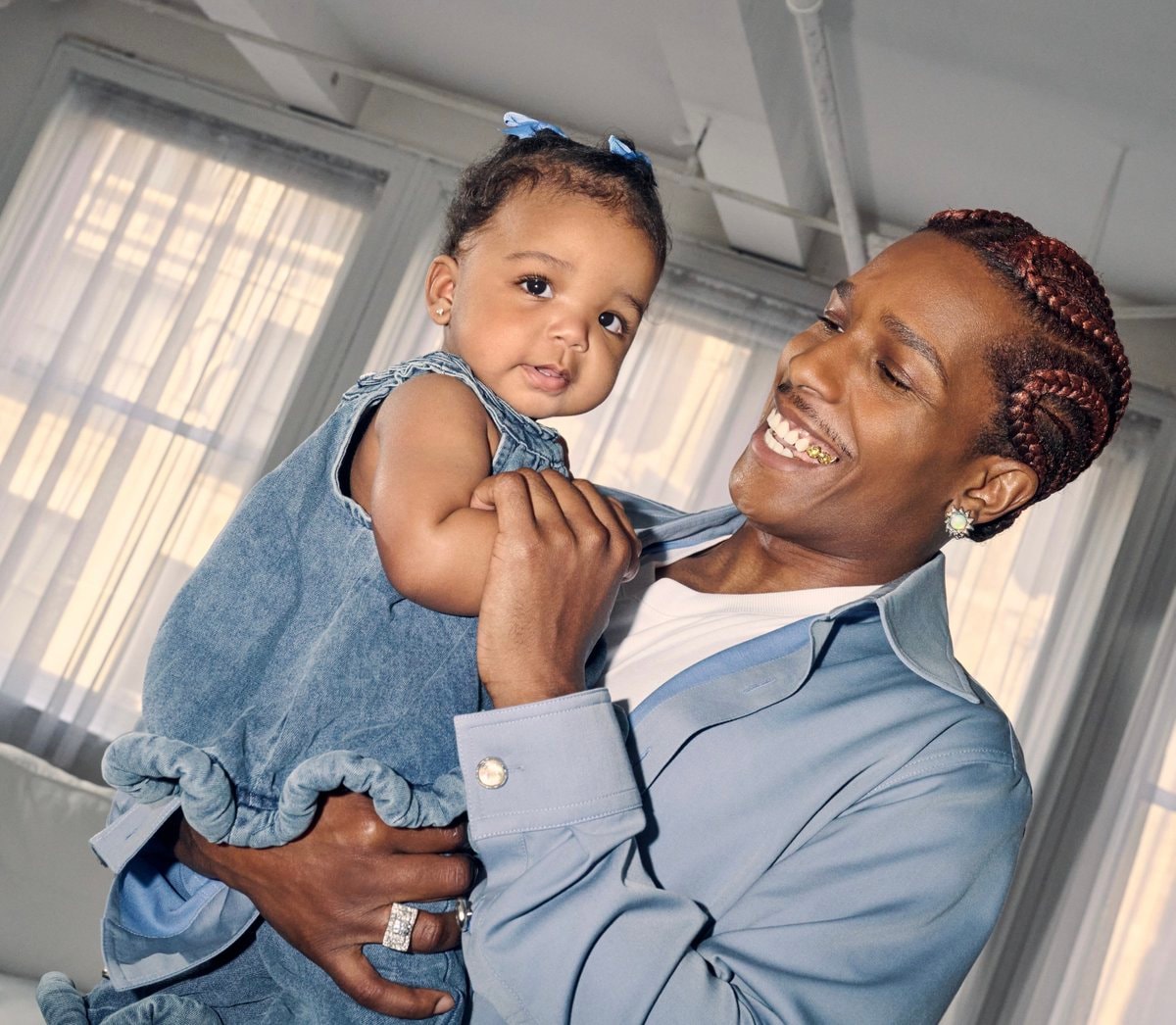 man holding baby