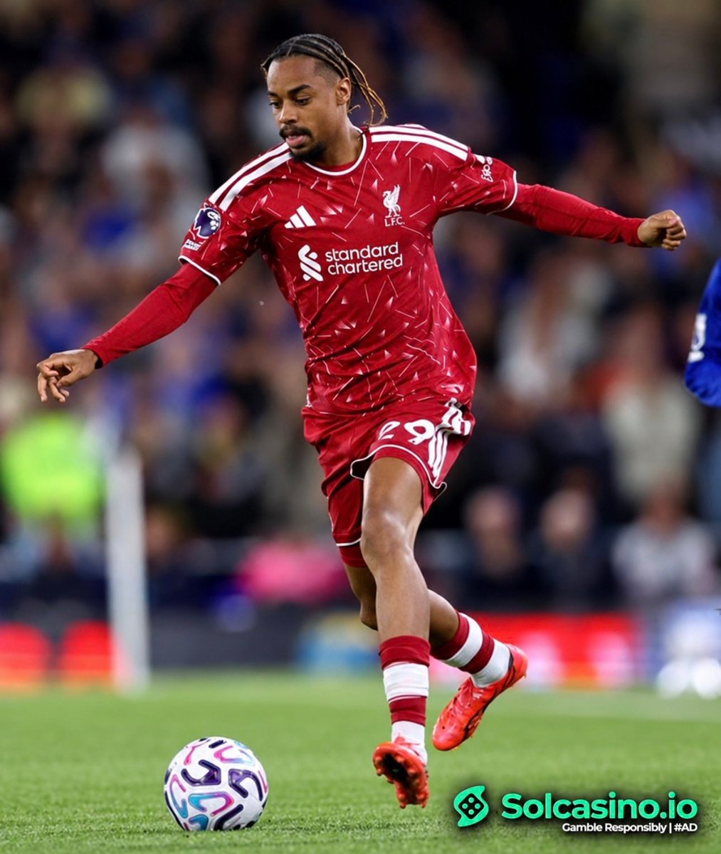 Liverpool player in red jersey