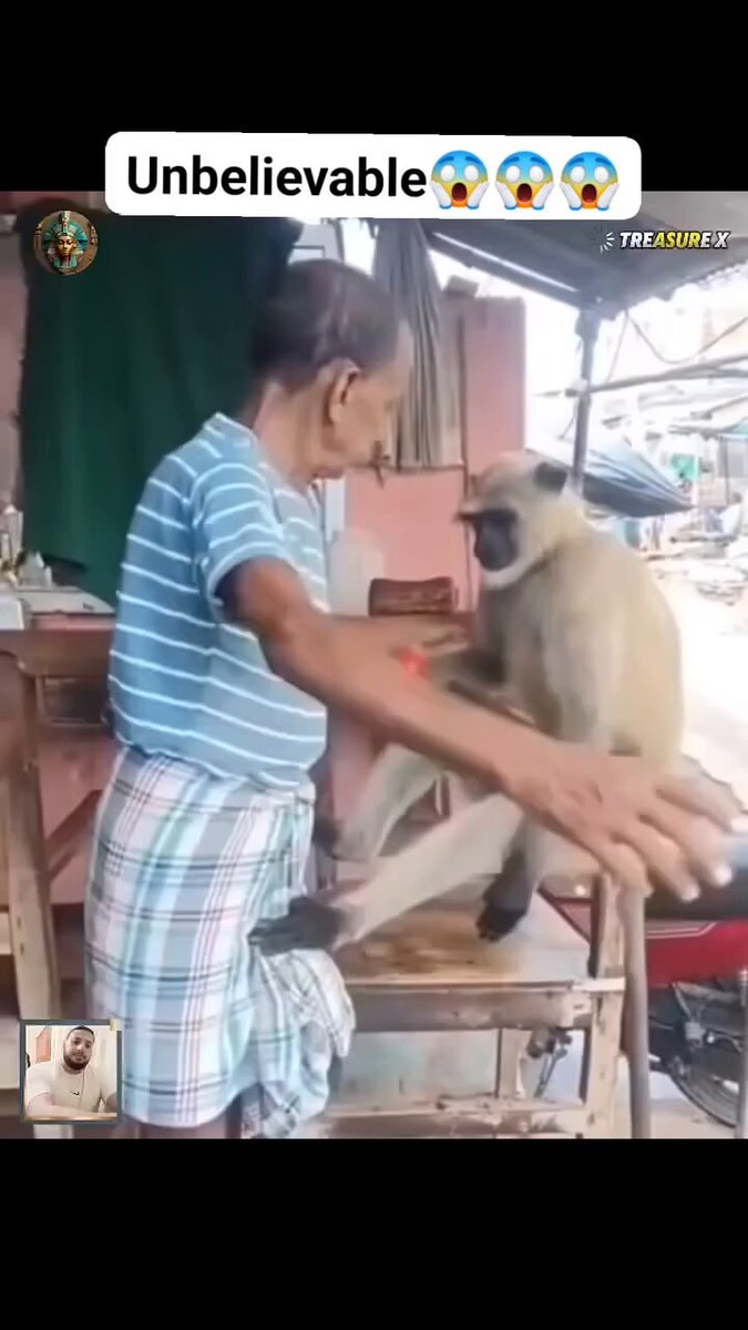 Elderly man with monkey SIM Camera