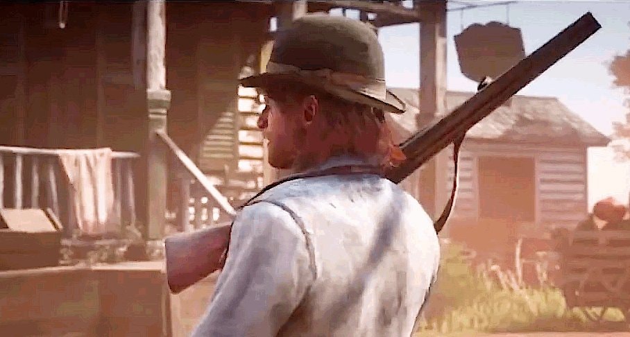 man with rifle and hat gif