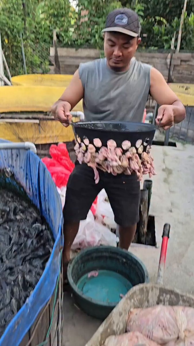 man holding colander outdoors