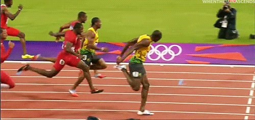 Usain Bolt crossing finish line leaning back