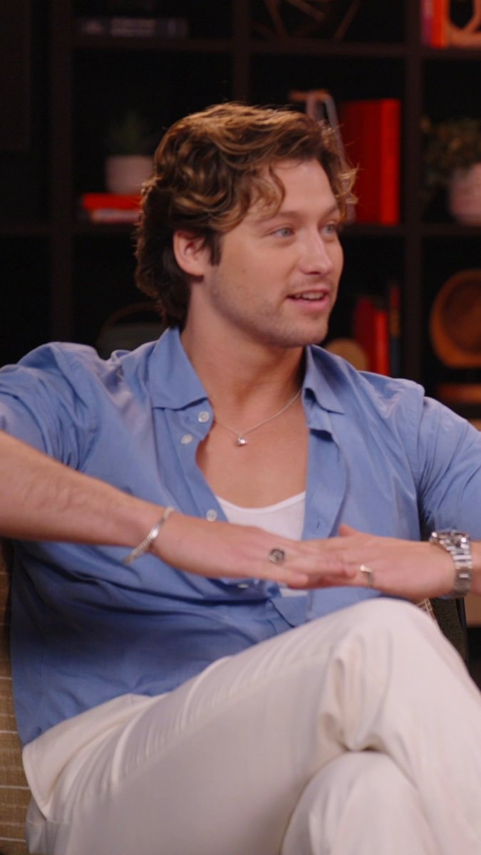 young man in blue button down shirt
