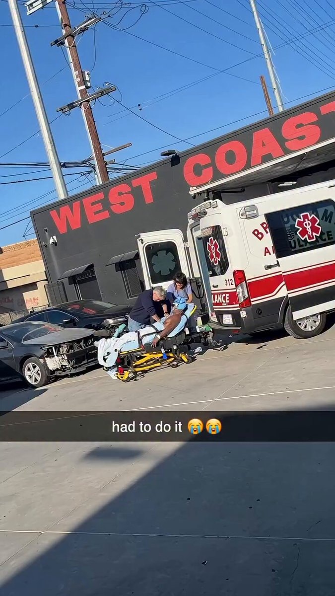 Man on stretcher outside West Coast