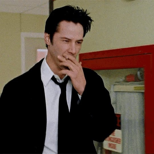 Keanu Reeves noir smirk