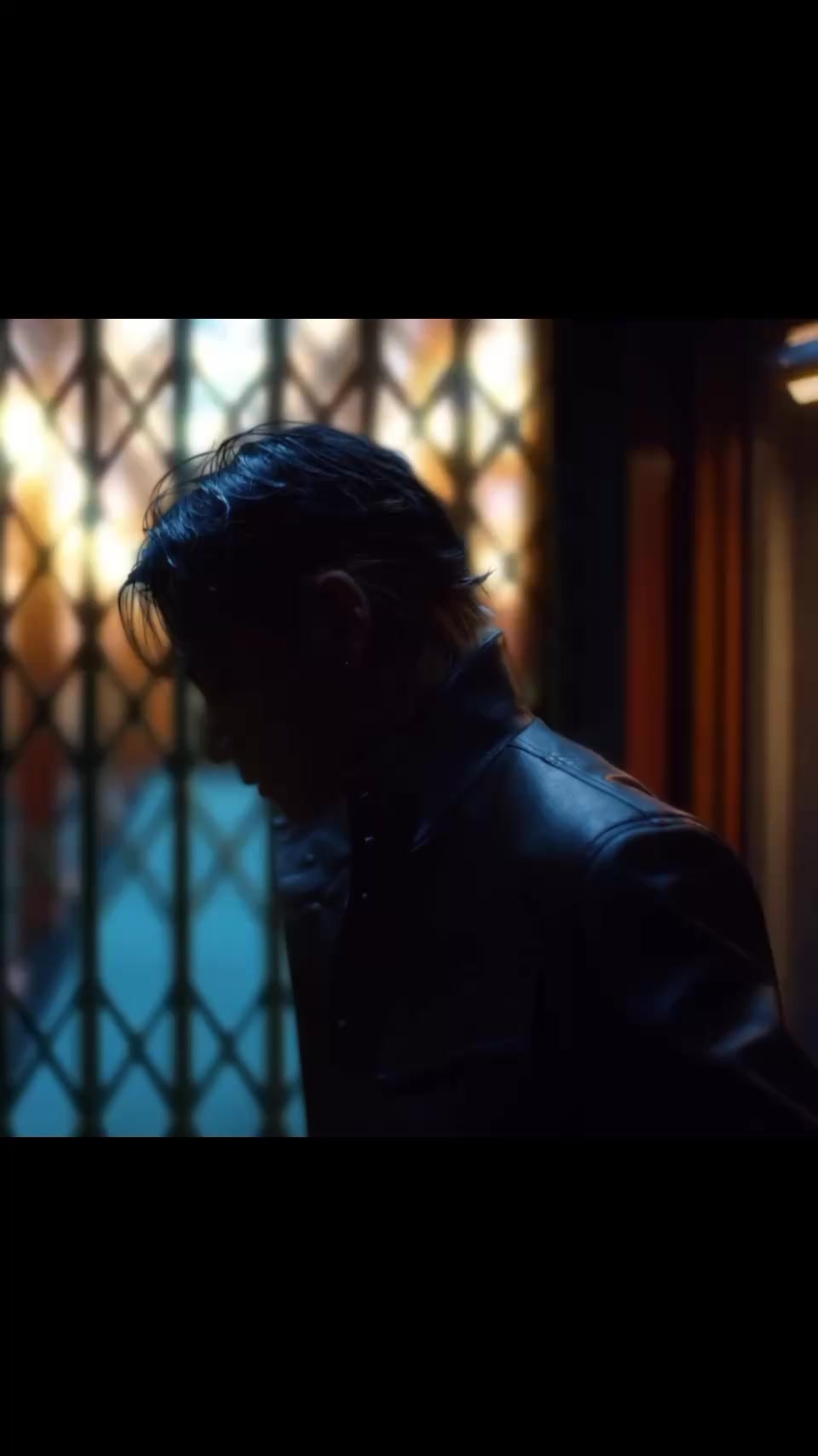 V black leather jacket