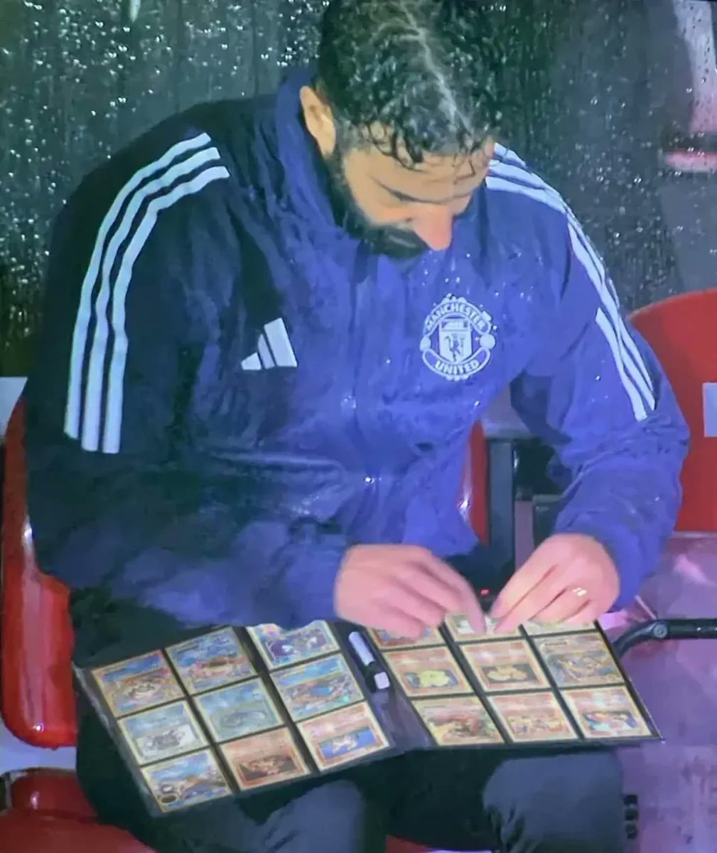 Manchester United fan and his Pokemon binder
