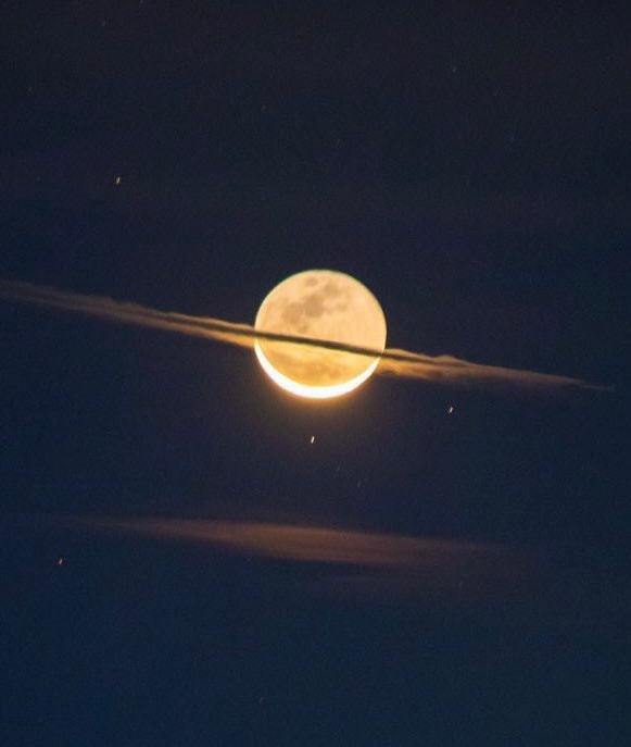 Plane crossing full moon (photo 2 of 2)