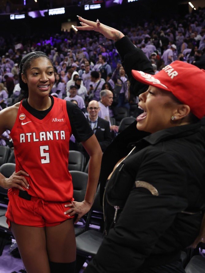 Angel Reese and Latto at WNBA Finals Game 2 (photo 3 of 4)