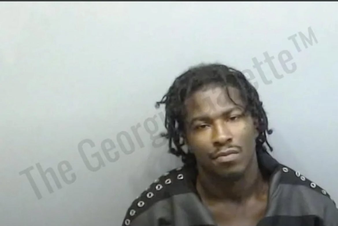 Nino Paid mugshot after extradition