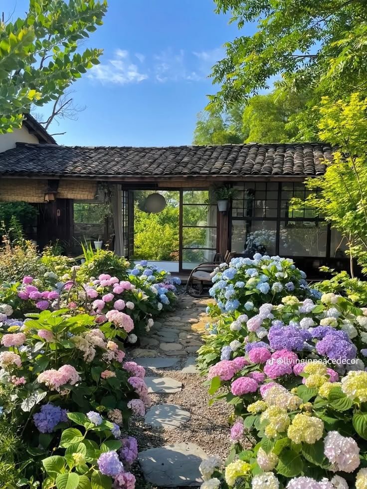 quaint house with pink roses garden (photo 4 of 4)