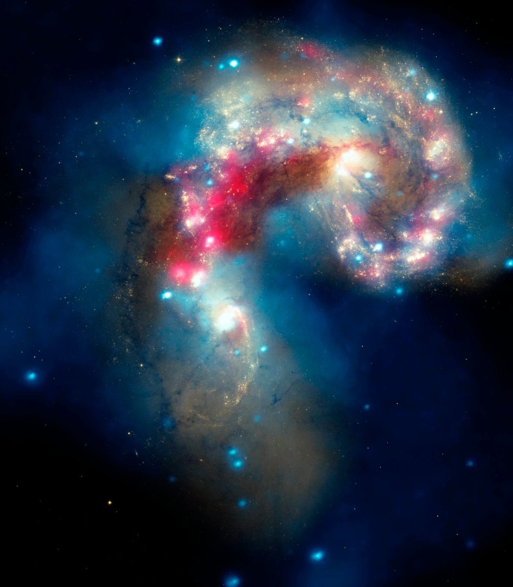 Two galaxies collide 64 million years away (photo 3 of 4)