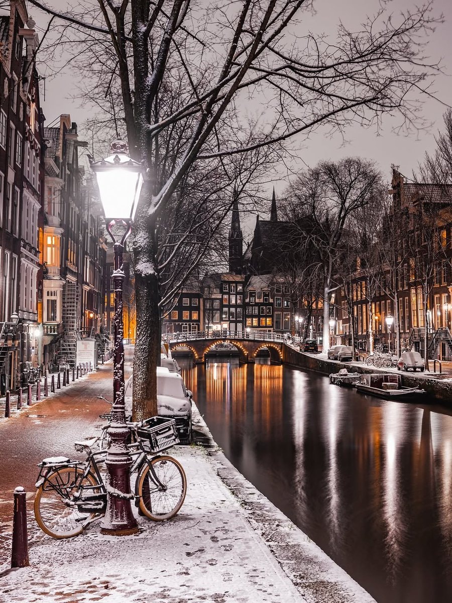 Amsterdam Netherlands snowy canal Amsterdam Netherlands snowy canal