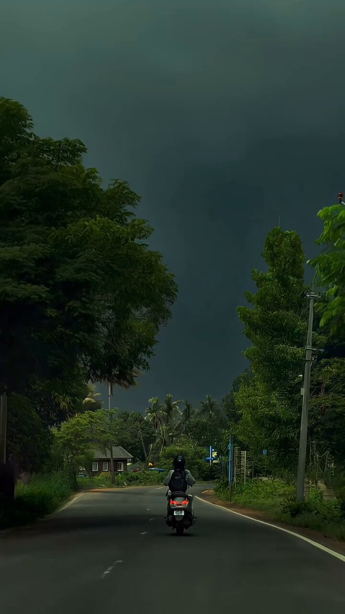 scooter ride in dark gray sky