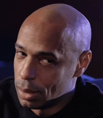 Bald man subtle smirk