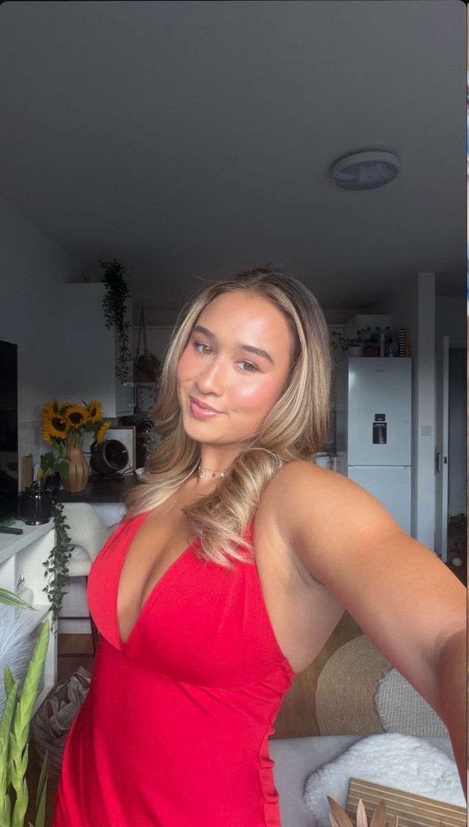 Emily Steel red dress selfie