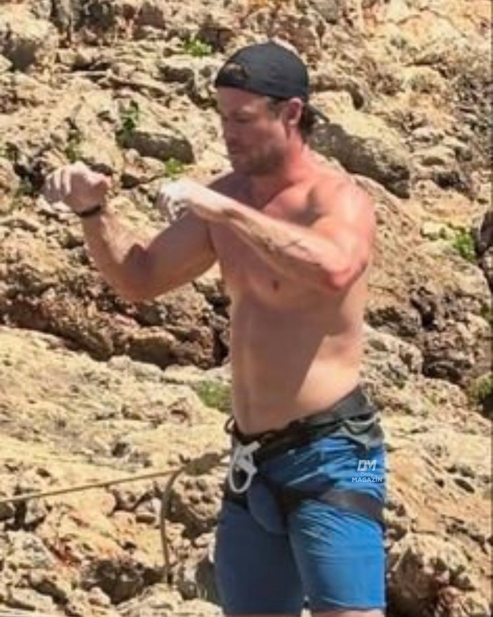 Thor shirtless rock climbing