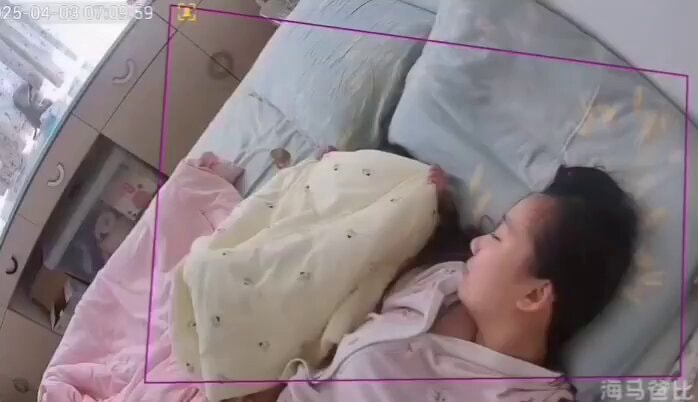 child sleeping under yellow blanket