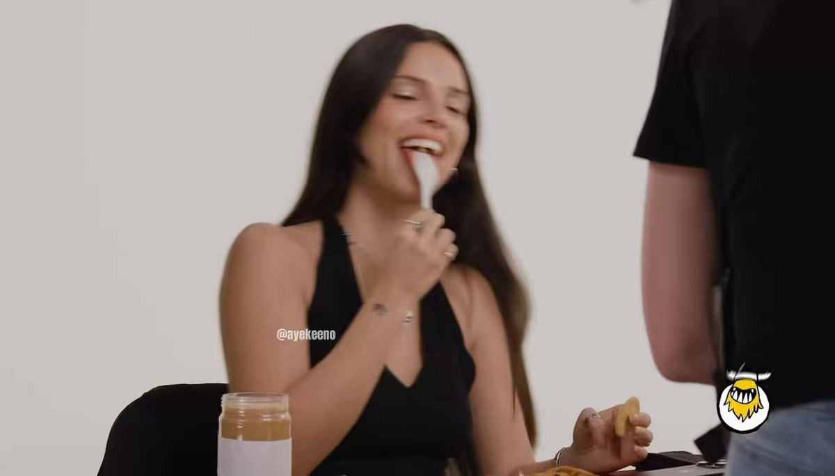 Michael Johnston comforts Inde Navarrette on Hot Ones
